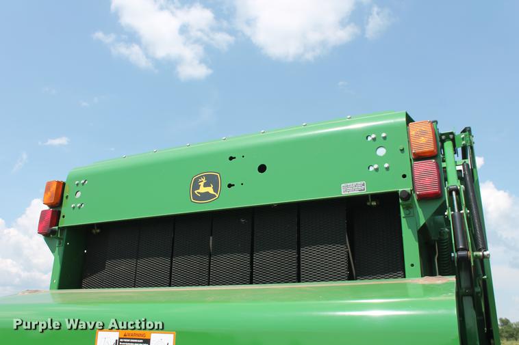 image for item DD5237 2015 John Deere 569 Mega Wide Plus round baler