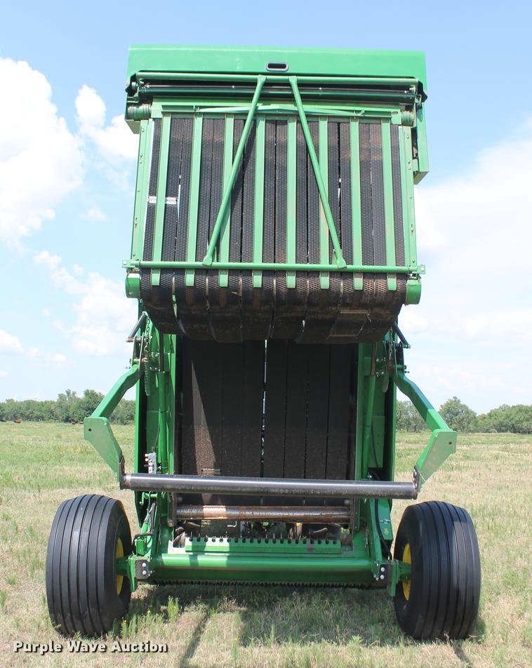 image for item DD5237 2015 John Deere 569 Mega Wide Plus round baler