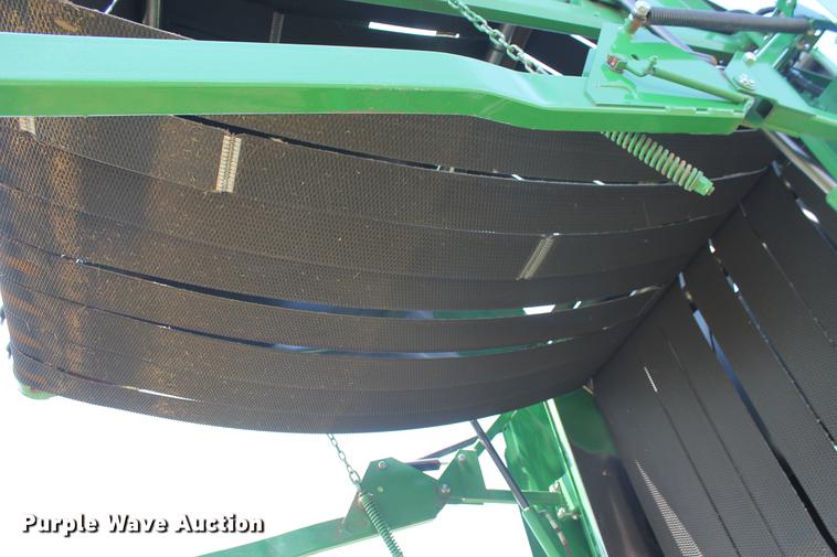 image for item DD5237 2015 John Deere 569 Mega Wide Plus round baler