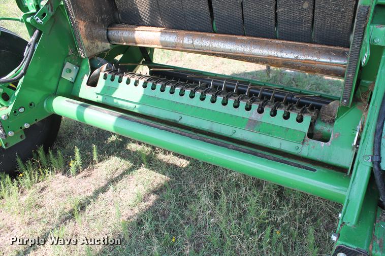 image for item DD5237 2015 John Deere 569 Mega Wide Plus round baler