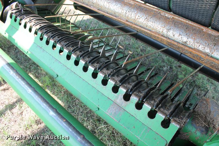 image for item DD5237 2015 John Deere 569 Mega Wide Plus round baler