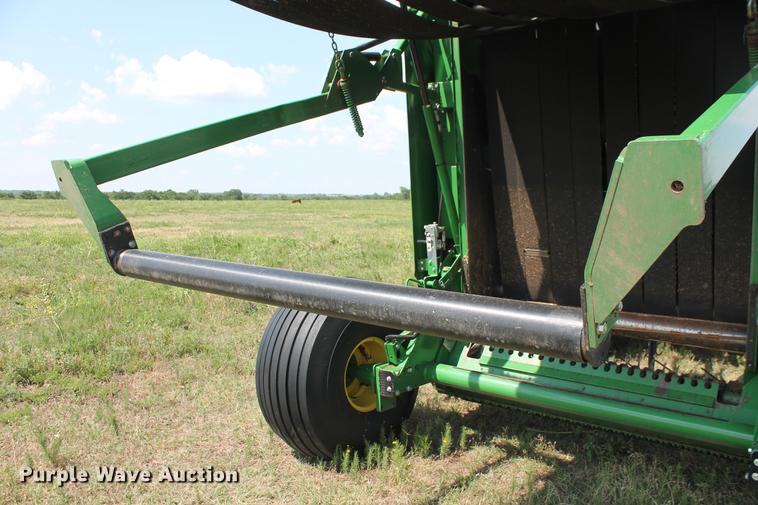 image for item DD5237 2015 John Deere 569 Mega Wide Plus round baler