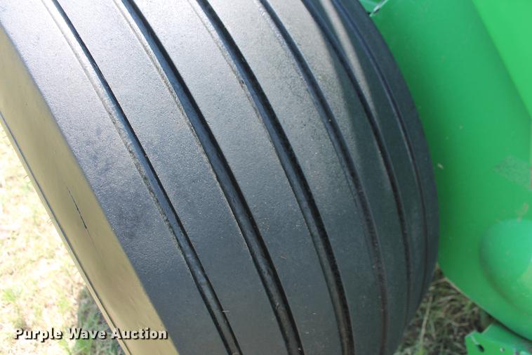 image for item DD5237 2015 John Deere 569 Mega Wide Plus round baler