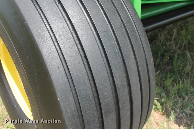 image for item DD5237 2015 John Deere 569 Mega Wide Plus round baler