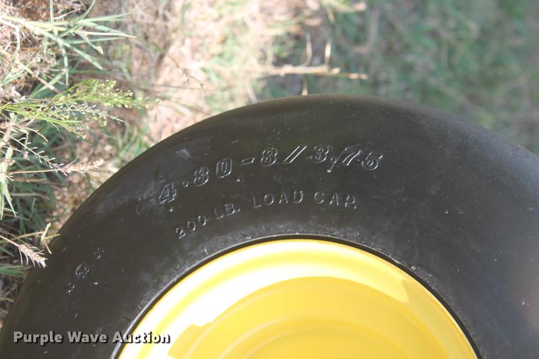 image for item DD5237 2015 John Deere 569 Mega Wide Plus round baler