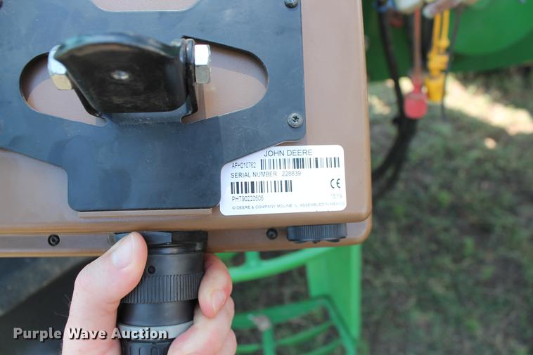 image for item DD5237 2015 John Deere 569 Mega Wide Plus round baler