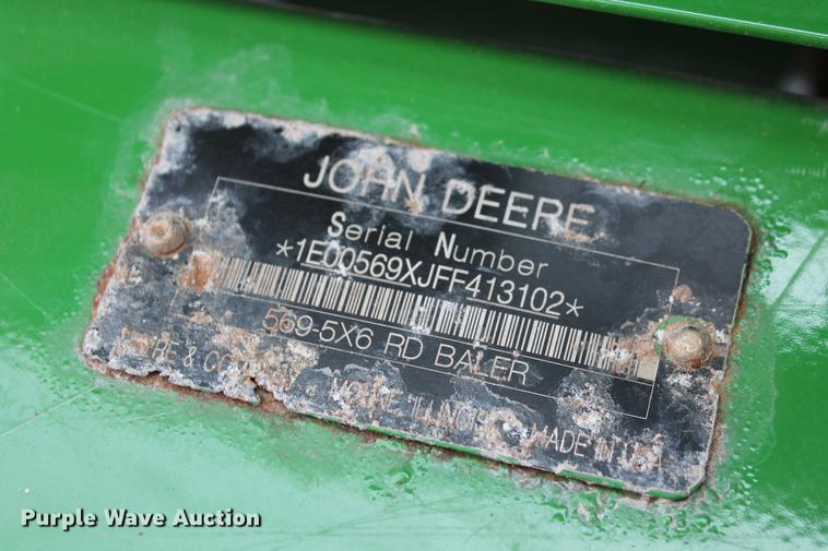 image for item DD5237 2015 John Deere 569 Mega Wide Plus round baler
