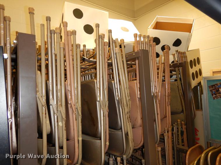 image for item EM9636 (3) racks of metal folding chairs