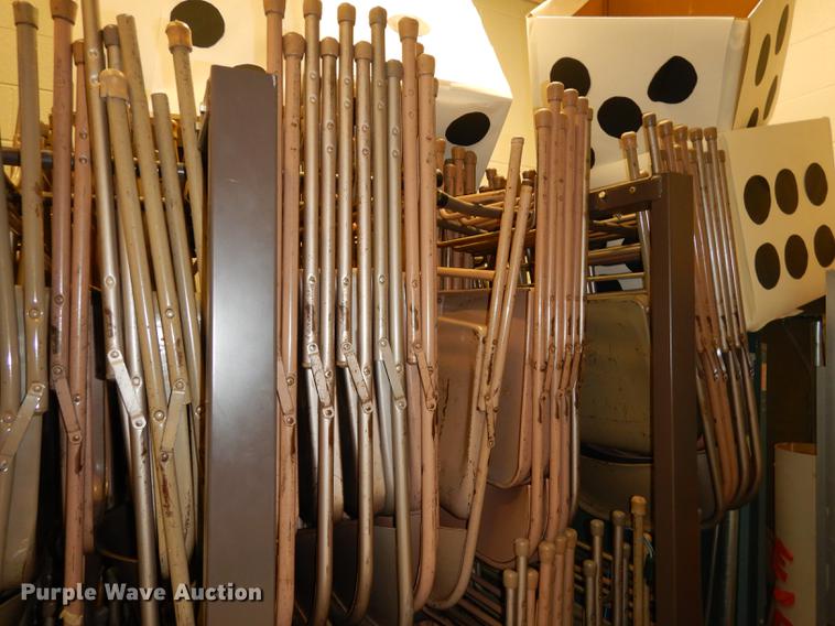 image for item EM9636 (3) racks of metal folding chairs