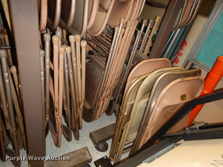 image for item EM9636 (3) racks of metal folding chairs