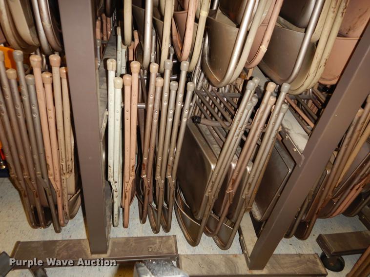 image for item EM9636 (3) racks of metal folding chairs