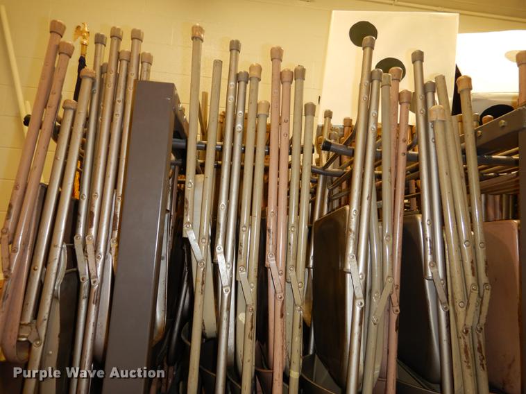 image for item EM9636 (3) racks of metal folding chairs