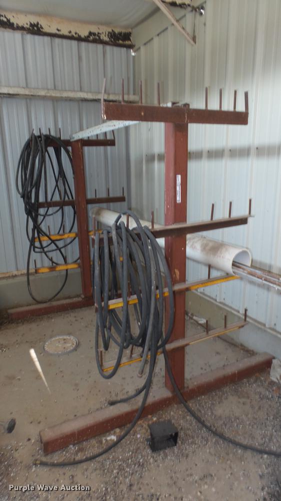 Metal pipe stand in Andover, KS Item ER9671 sold Purple Wave
