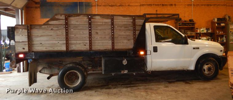 image for item DB8316 2003 Ford F350 Super Duty XL flat dump bed pickup truck