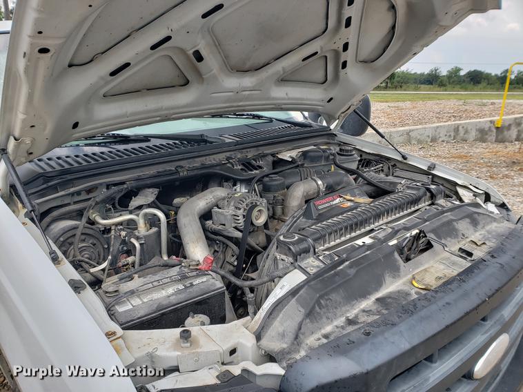 image for item DF2408 2006 Ford F350 Super Duty Crew Cab flatbed pickup truck