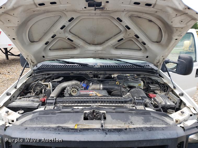 image for item DF2408 2006 Ford F350 Super Duty Crew Cab flatbed pickup truck