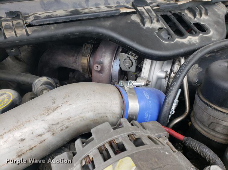 image for item DF2408 2006 Ford F350 Super Duty Crew Cab flatbed pickup truck