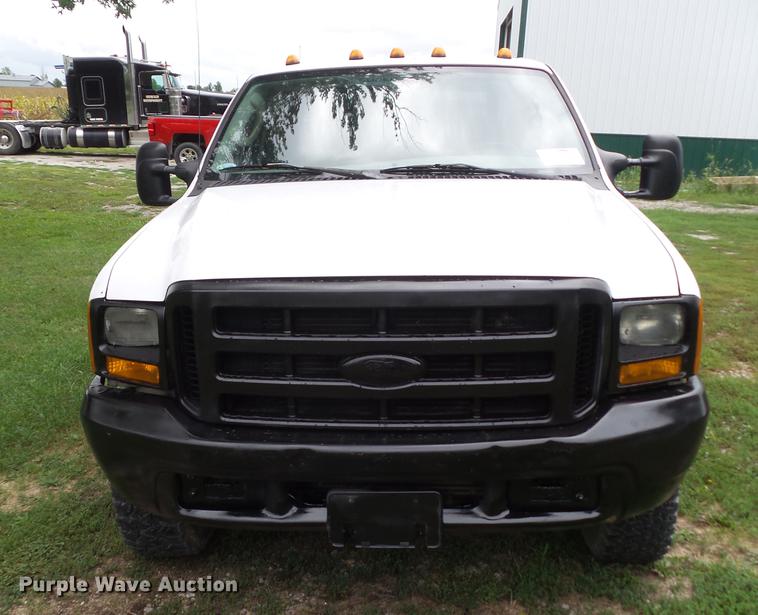 image for item L5695 2005 Ford F350 Super Duty Crew Cab flatbed pickup truck