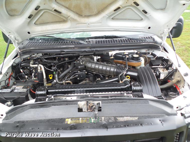 image for item L5695 2005 Ford F350 Super Duty Crew Cab flatbed pickup truck