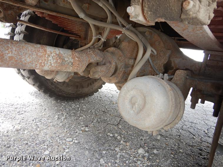 image for item DB8309 1999 Ford F800 digger derrick truck