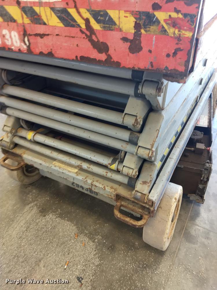 image for item ER9046 1999 Skyjack SJIII 4830 scissor lift
