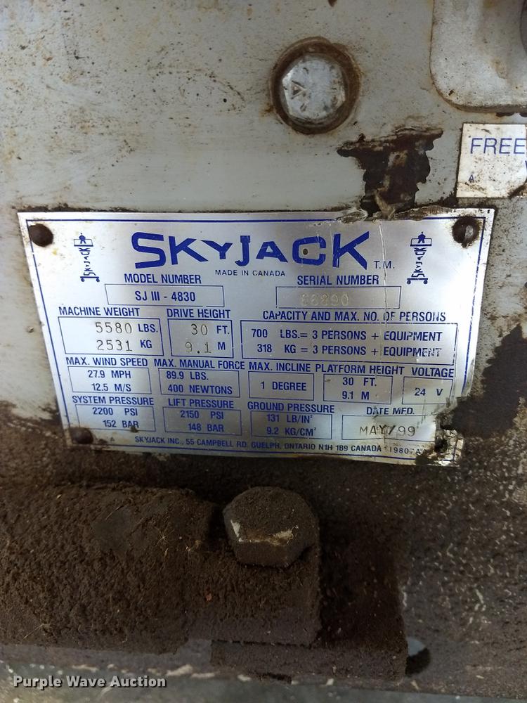 image for item ER9046 1999 Skyjack SJIII 4830 scissor lift