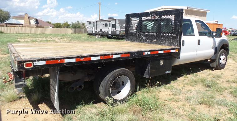 image for item FB9500 2012 Ford F550 Super Duty Crew Cab flatbed truck