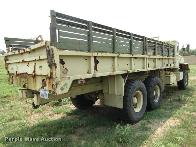 image for item DC0043 1989 BMY Harsco M972A2 flatbed truck