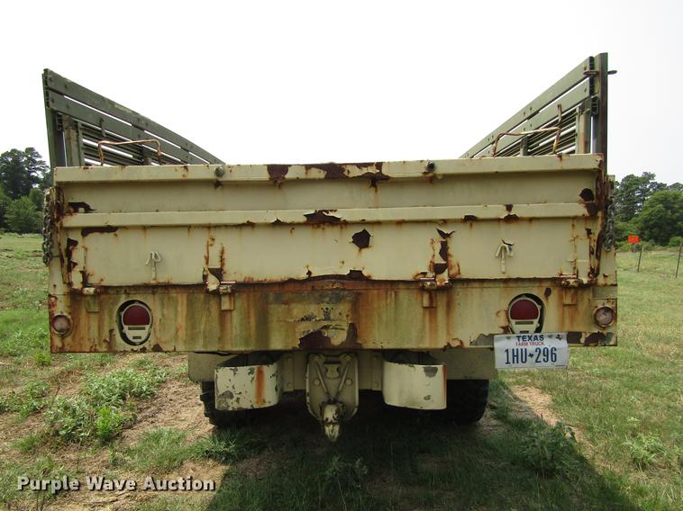 image for item DC0043 1989 BMY Harsco M972A2 flatbed truck