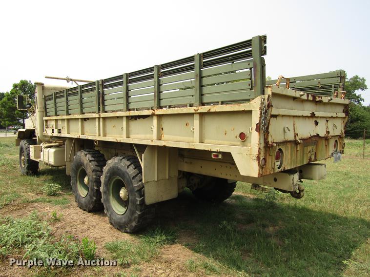 image for item DC0043 1989 BMY Harsco M972A2 flatbed truck