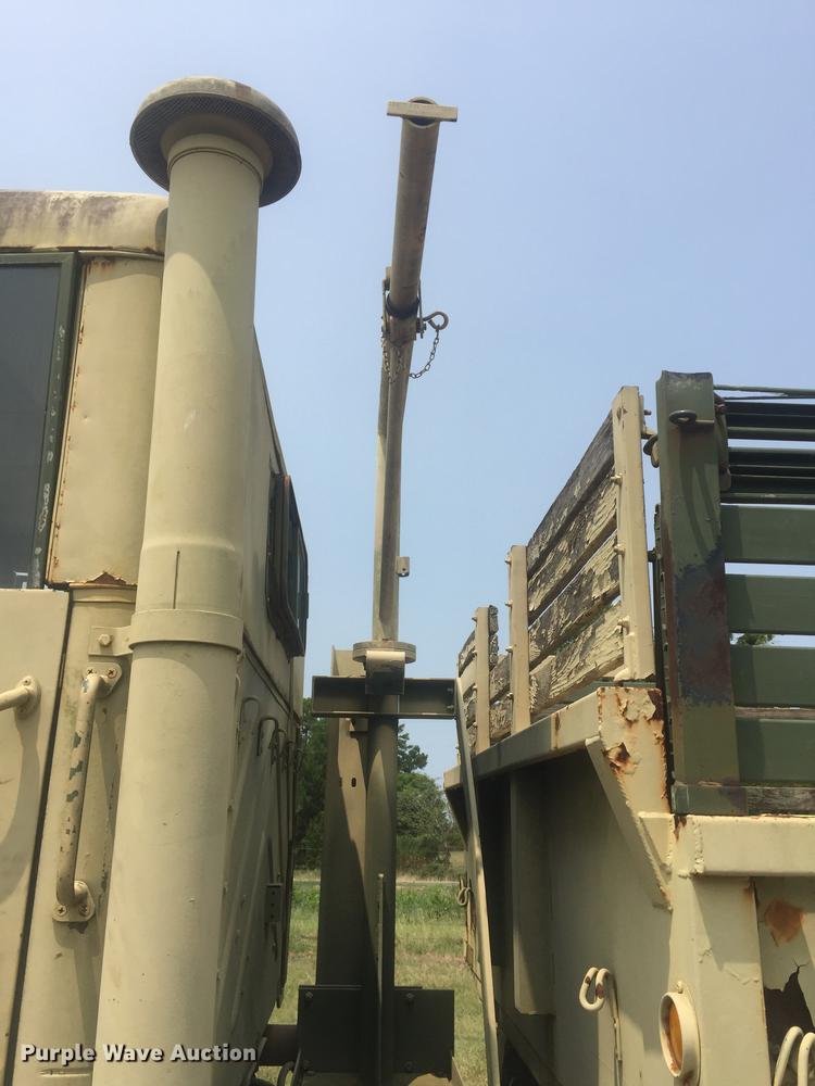 image for item DC0043 1989 BMY Harsco M972A2 flatbed truck