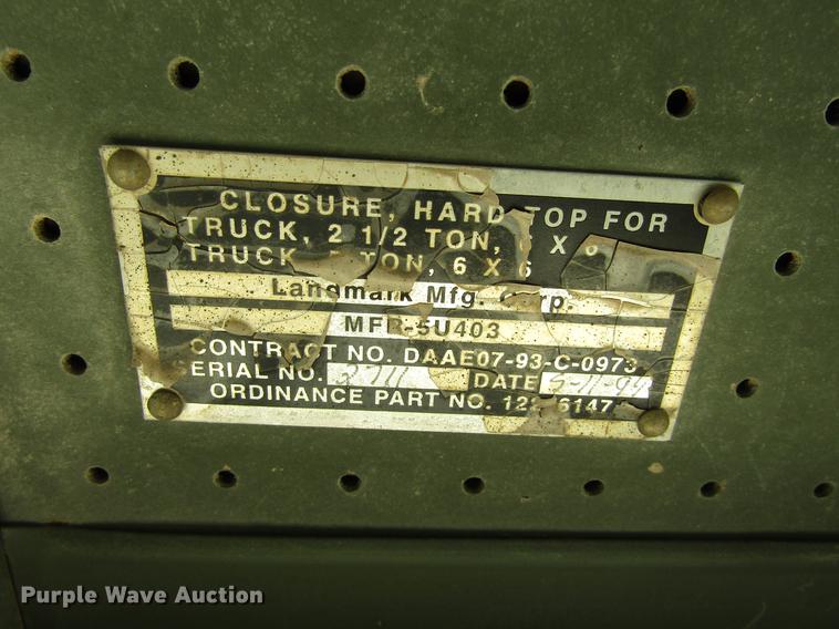 image for item DC0043 1989 BMY Harsco M972A2 flatbed truck