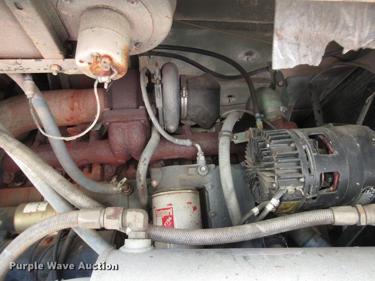 image for item DC0043 1989 BMY Harsco M972A2 flatbed truck