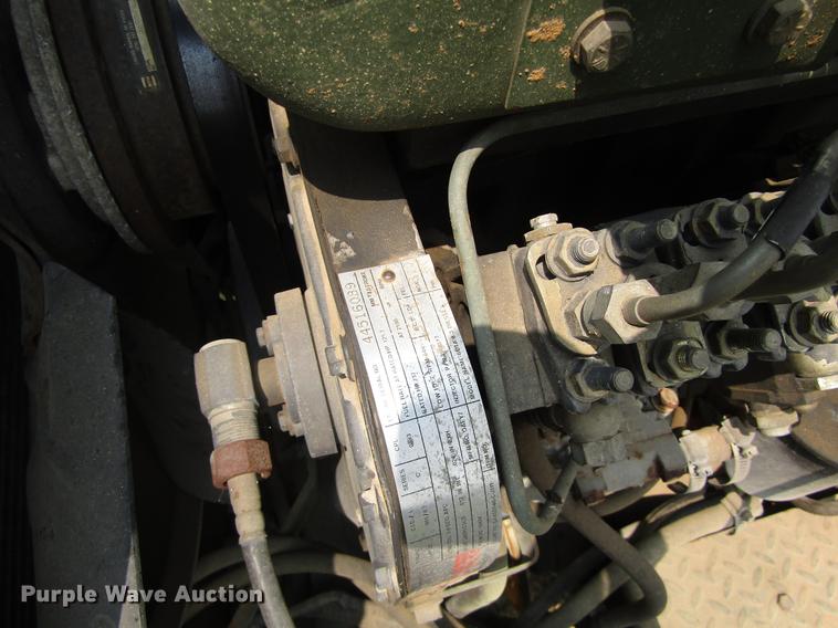 image for item DC0043 1989 BMY Harsco M972A2 flatbed truck