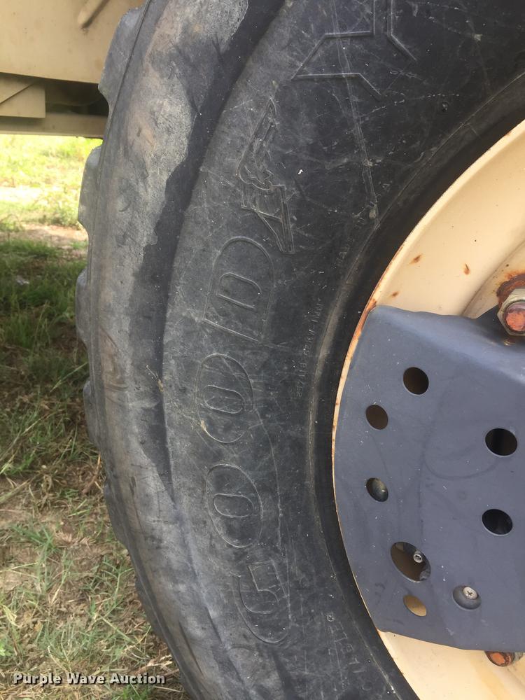 image for item DC0043 1989 BMY Harsco M972A2 flatbed truck