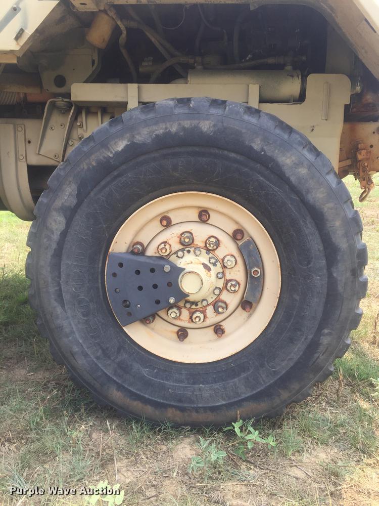 image for item DC0043 1989 BMY Harsco M972A2 flatbed truck