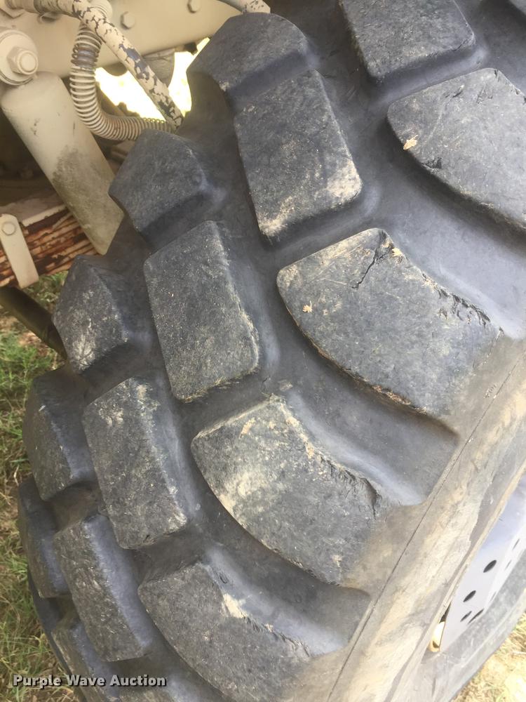 image for item DC0043 1989 BMY Harsco M972A2 flatbed truck