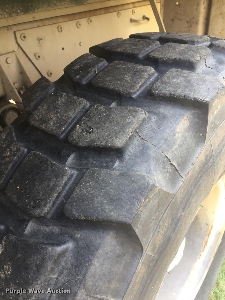 image for item DC0043 1989 BMY Harsco M972A2 flatbed truck