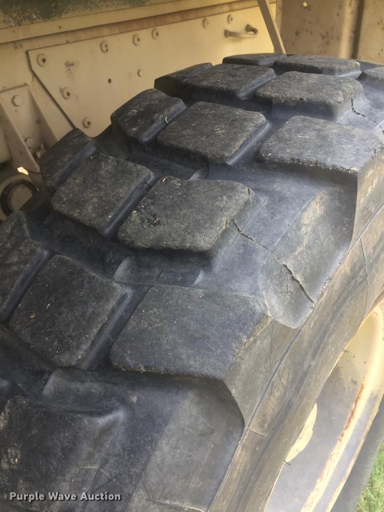 image for item DC0043 1989 BMY Harsco M972A2 flatbed truck