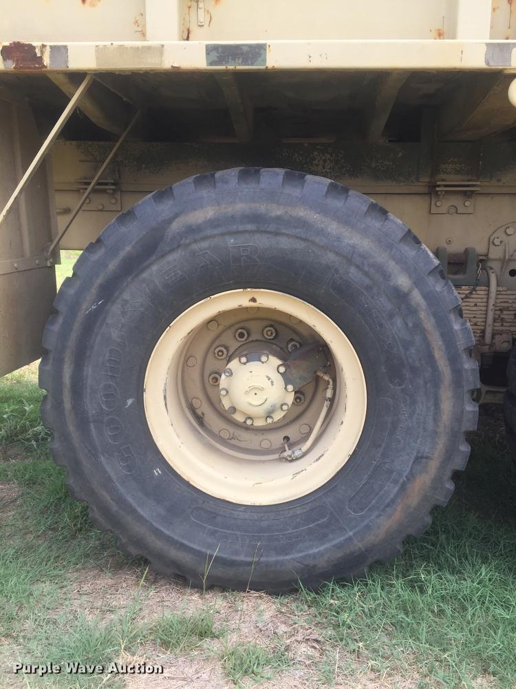 image for item DC0043 1989 BMY Harsco M972A2 flatbed truck