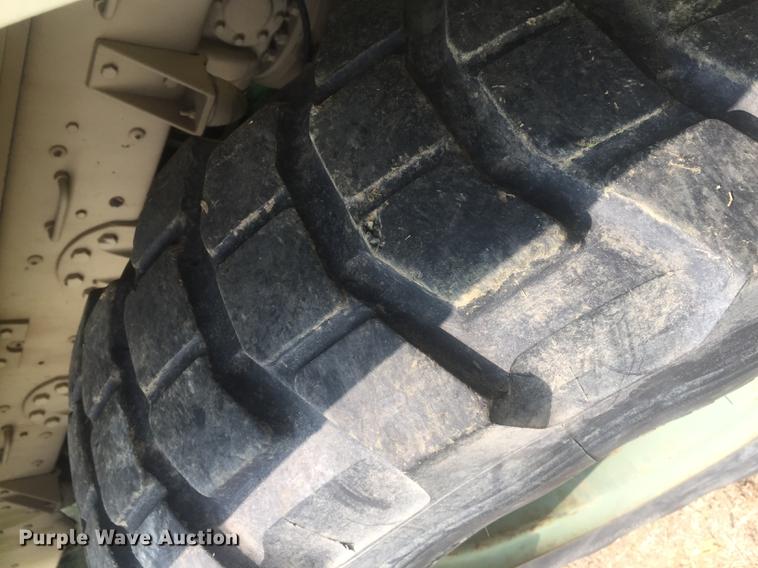 image for item DC0043 1989 BMY Harsco M972A2 flatbed truck