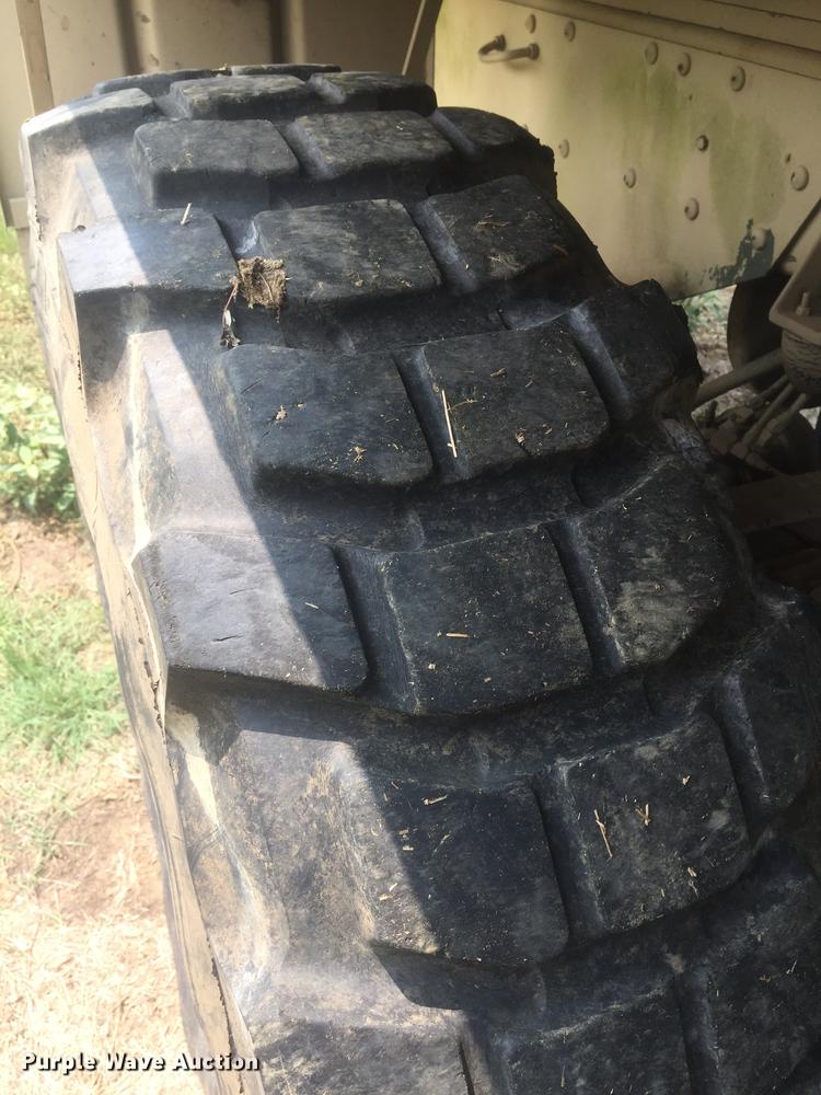 image for item DC0043 1989 BMY Harsco M972A2 flatbed truck