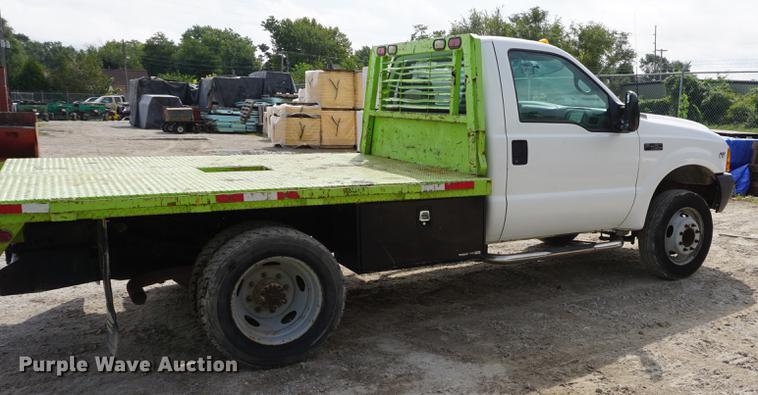 image for item DD6469 1999 Ford F450 Super Duty flatbed truck