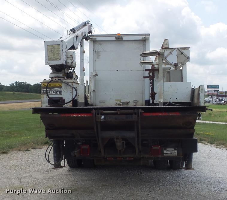 image for item DD7232 2005 Freightliner FL80 Crew Cab flatbed truck