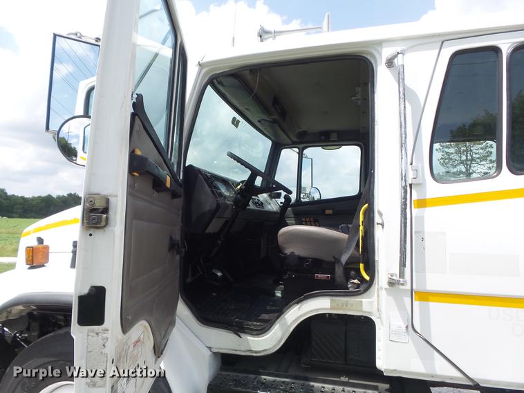 image for item DD7232 2005 Freightliner FL80 Crew Cab flatbed truck