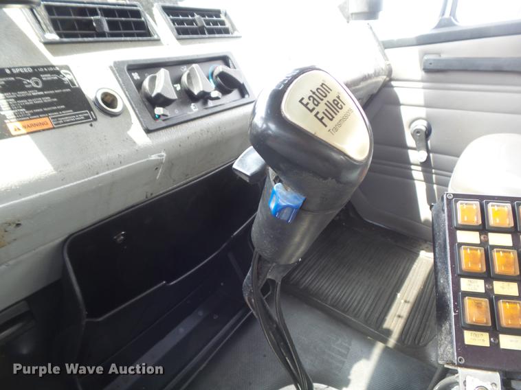 image for item DD7232 2005 Freightliner FL80 Crew Cab flatbed truck