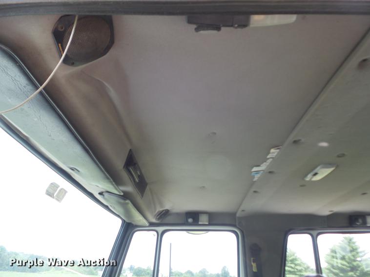 image for item DD7232 2005 Freightliner FL80 Crew Cab flatbed truck