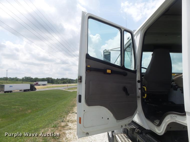 image for item DD7232 2005 Freightliner FL80 Crew Cab flatbed truck