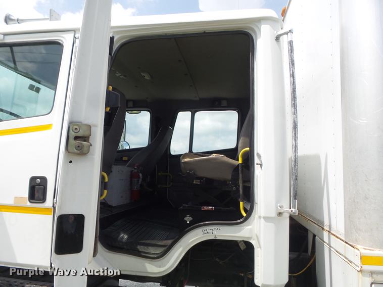 image for item DD7232 2005 Freightliner FL80 Crew Cab flatbed truck
