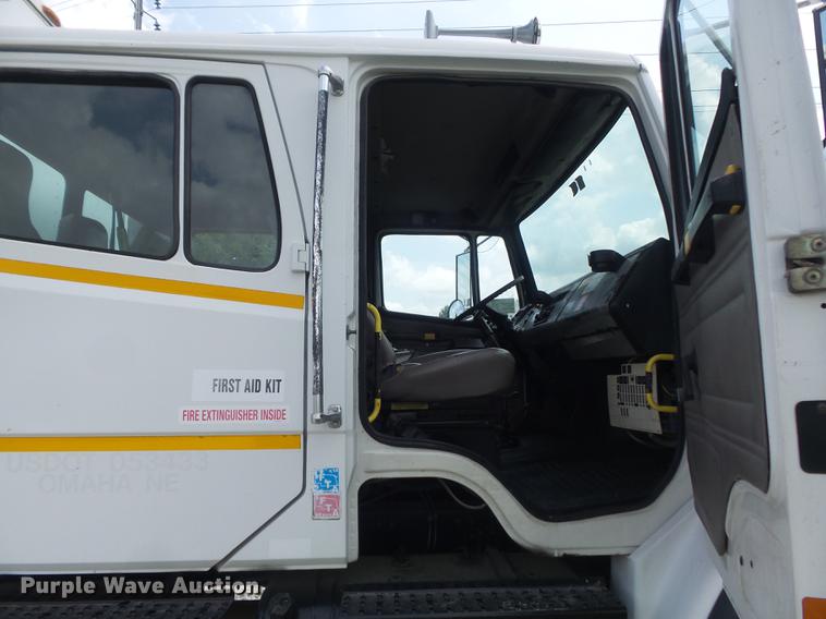 image for item DD7232 2005 Freightliner FL80 Crew Cab flatbed truck